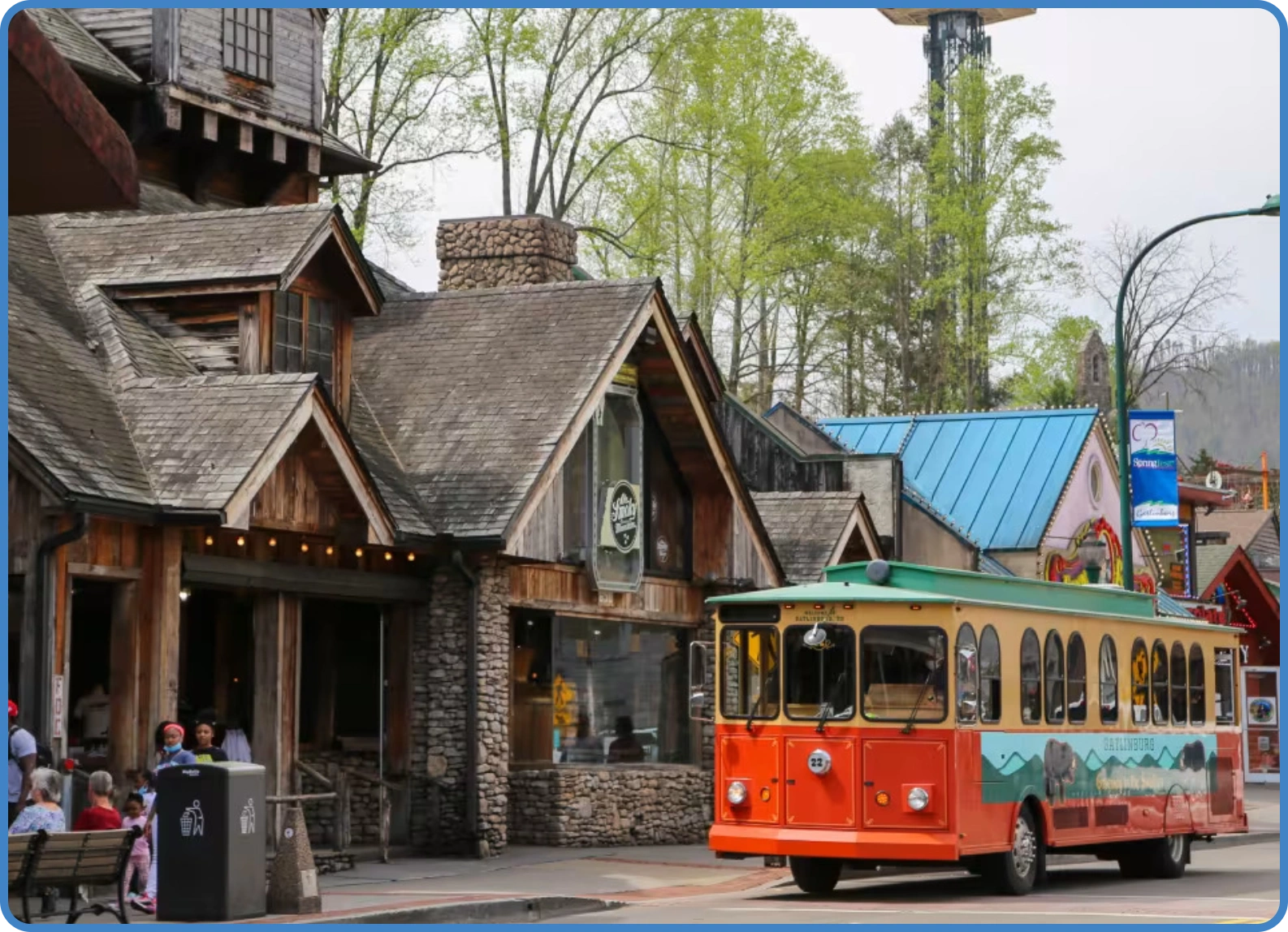 A trolley travels along the street | The Mountain Music Festival